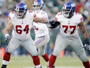 New York Giants guard Kevin Boothe leaves the field after beating