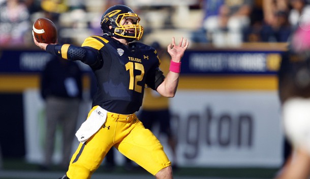 Oct 10, 2015; Toledo, OH, USA; Toledo Rockets quarterback Phillip Ely (12) throws the ball during the third quarter against the Kent State Golden Flashes at Glass Bowl. Rockets win 38-7. Mandatory Credit: Raj Mehta-USA TODAY Sports