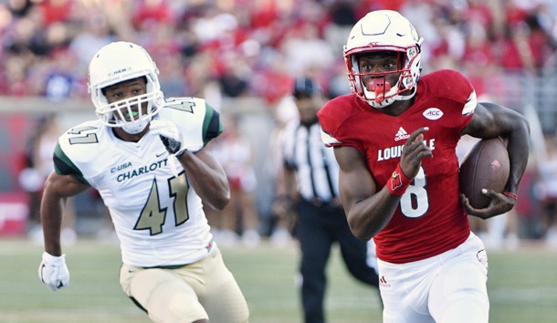 Sep 1, 2016; Louisville, KY, USA;  Louisville Cardinals quarterback Lamar Jackson (8) runs the ball past Charlotte 49ers linebacker Carl Yonter (47) for a touchdown during the first quarter at Papa John's Cardinal Stadium. Photo Credit: Jamie Rhodes-USA TODAY Sports