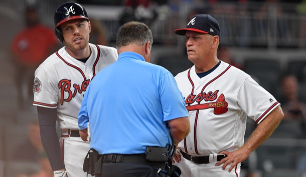 May 17, 2017; Atlanta, GA, USA; Atlanta Braves first baseman Freddie Freeman (5) is checked by the trainer while standing next to manager Brian Snitker (43) after being hit by a pitch against the Toronto Blue Jays during the fifth inning at SunTrust Park. Photo Credit: Dale Zanine-USA TODAY Sports