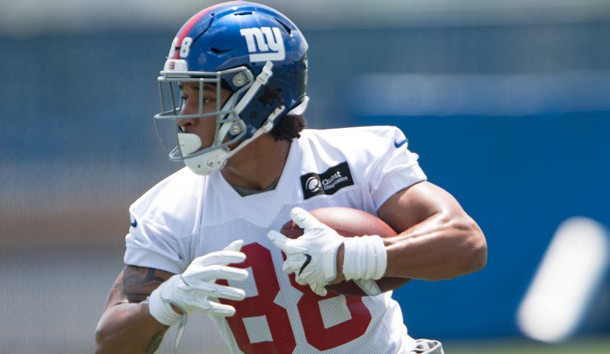 Jun 13, 2017; East Rutherford, NJ, USA; New York Giants tight end Evan Engram (88) runs after catching the ball during mini camp at Quest Diagnostics Training Center. Photo Credit: William Hauser-USA TODAY Sports