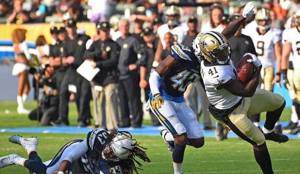 Aug 20, 2017; Carson, CA, USA; New Orleans Saints running back Alvin Kamara (41) gets past Los Angeles Chargers defensive back Tre Boston (33) and Los Angeles Chargers cornerback Michael Davis (43) as he runs for a touchdown in the first quarter of the game at StubHub Center. Photo Credit: Jayne Kamin-Oncea-USA TODAY Sports