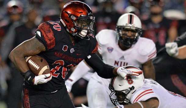 Sep 30, 2017; San Diego, CA, USA; San Diego State Aztecs running back Rashaad Penny (20) is defended by Northern Illinois Huskies safety Mykelti Williams (8) during the fourth quarter at SDCCU Stadium. Photo Credit: Jake Roth-USA TODAY Sports