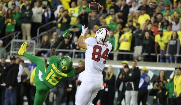 Sep 22, 2018; Eugene, OR, USA;  Stanford Cardinal tight end Colby Parkinson (84) tips the ball to himself for a touchdown over Oregon Ducks cornerback Deommodore Lenoir (15) in overtime at Autzen Stadium. Photo Credit: Jaime Valdez-USA TODAY Sports