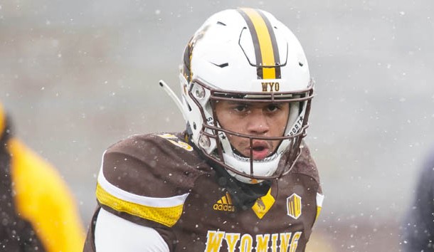 Nov 17, 2018; Laramie, WY, USA; Wyoming Cowboys quarterback Sean Chambers (12) warms up before game against the Air Force Falcons at Jonah Field War Memorial Stadium. Photo Credit: Troy Babbitt-USA TODAY Sports