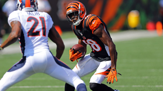 Sep 25, 2016; Cincinnati, OH, USA; Cincinnati Bengals wide receiver A.J. Green (18) makes a move past Denver Broncos cornerback Aqib Talib (21) in the first half at Paul Brown Stadium. Photo Credit: Aaron Doster-USA TODAY Sports