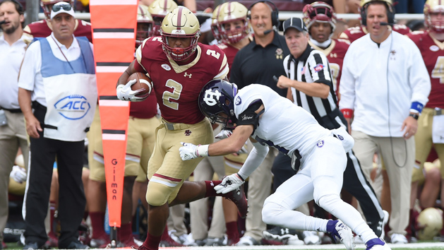 Sep 8, 2018; Chestnut Hill, MA, USA; Holy Cross Crusaders defensive back Chris Riley (7) tries to tackle Boston College Eagles running back AJ Dillon (2) during the first half at Alumni Stadium. Photo Credit: Bob DeChiara-USA TODAY Sports