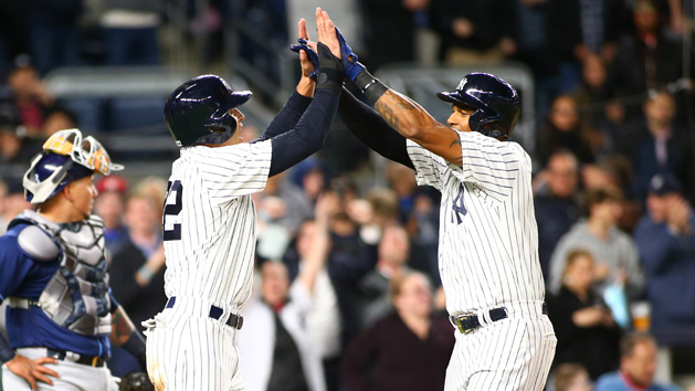Apr 13, 2017; Bronx, NY, USA; New York Yankees left fielder Aaron Hicks (right) is congratulated by centerfielder Jacoby Ellsbury (22) after hitting a two run home during the seventh inning at Yankee Stadium. Photo Credit: Andy Marlin-USA TODAY Sports