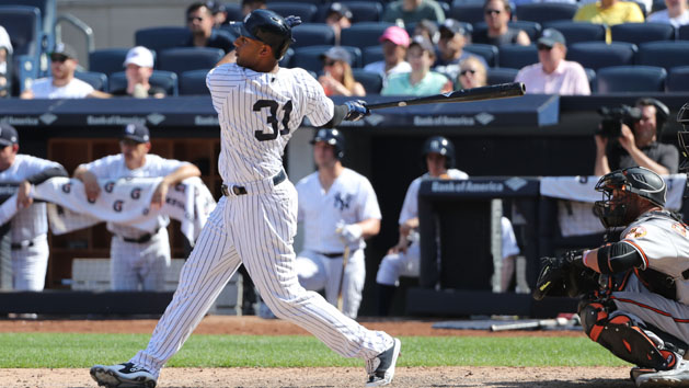 Jun 11, 2017; Bronx, NY, USA; New York Yankees center fielder Aaron Hicks (31) doubles to deep right center allowing two runners to score during the seventh inning against the Baltimore Orioles at Yankee Stadium. Photo Credit: Anthony Gruppuso-USA TODAY Sports
