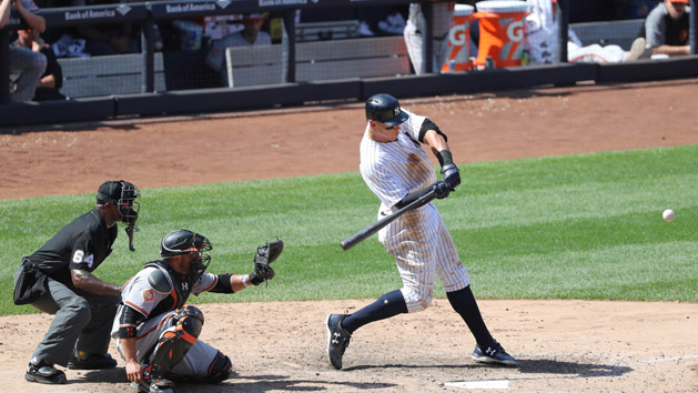 Jun 11, 2017; Bronx, NY, USA; New York Yankees right fielder Aaron Judge (99) hits a home run to left center field during the sixth inning against the Baltimore Orioles at Yankee Stadium. Photo Credit: Anthony Gruppuso-USA TODAY Sports