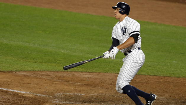 Oct 3, 2017; Bronx, NY, USA; New York Yankees right fielder Aaron Judge (99) hits a two run home run against the Minnesota Twins during the fourth inning in the 2017 American League wildcard playoff baseball game at Yankee Stadium. Photo Credit: Adam Hunger-USA TODAY Sports
