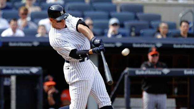 Apr 29, 2017; Bronx, NY, USA; New York Yankees right fielder Aaron Judge (99) hits a home run in the seventh inning against the Baltimore Orioles at Yankee Stadium. Photo Credit: Noah K. Murray-USA TODAY Sports
