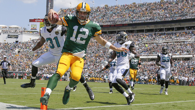 Green Bay quarterbacks Aaron Rodgers (12), Joe Callahan (6) and Brett Hundley (7) participate in drills during training camp at Ray Nitschke Field. Photo Credit: Benny Sieu-USA TODAY Sports