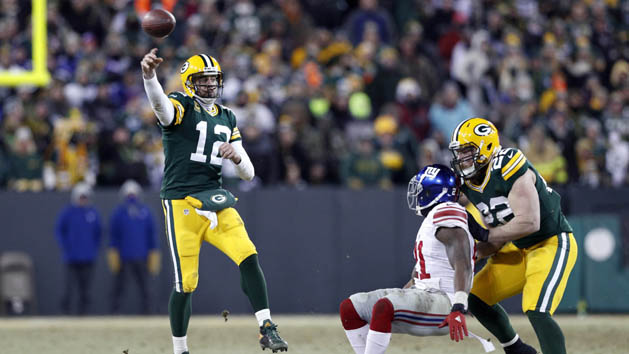 Jan 8, 2017; Green Bay, WI, USA; Green Bay Packers quarterback Aaron Rodgers (12) drops back to pass against the New York Giants during the second half in the NFC Wild Card playoff football game at Lambeau Field. Photo Credit: Jeff Hanisch-USA TODAY Sports