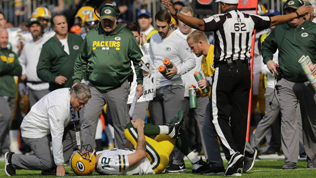 Oct 15, 2017; Minneapolis, MN, USA; Green Bay Packers quarterback Aaron Rodgers (12) holds his knee after getting injured in the first quarter during their football game against the Minnesota Vikings at U.S. Bank Stadium. Photo Credit: Dan Powers/Appleton Post Crescent via USA TODAY Sports