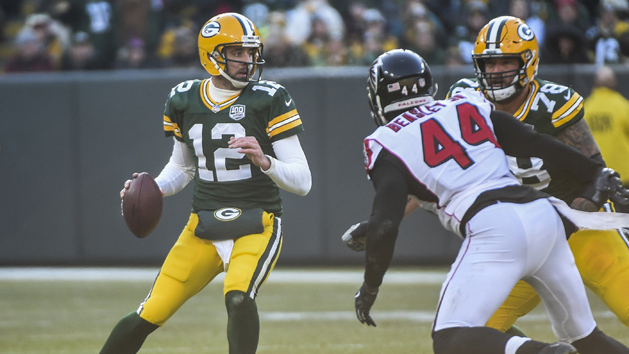 Nov 11, 2018; Green Bay, WI, USA; Green Bay Packers quarterback Aaron Rodgers (12) celebrates a touchdown during the second quarter against the Miami Dolphins at Lambeau Field. Photo Credit: Jeff Hanisch-USA TODAY Sports