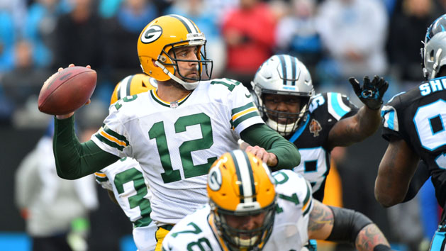 Dec 17, 2017; Charlotte, NC, USA; Green Bay Packers quarterback Aaron Rodgers (12) looks to pass as Carolina Panthers outside linebacker Thomas Davis (58) pressures in the fourth quarter at Bank of America Stadium. Photo Credit: Bob Donnan-USA TODAY Sports