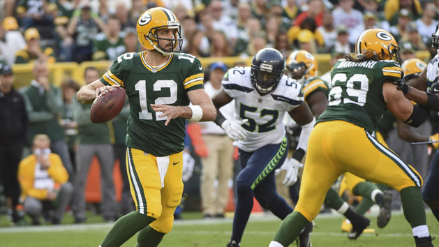 Jan 8, 2017; Green Bay, WI, USA; Green Bay Packers quarterback Aaron Rodgers (12) drops back to pass against the New York Giants during the second half in the NFC Wild Card playoff football game at Lambeau Field. Mandatory Credit: Jeff Hanisch-USA TODAY Sports