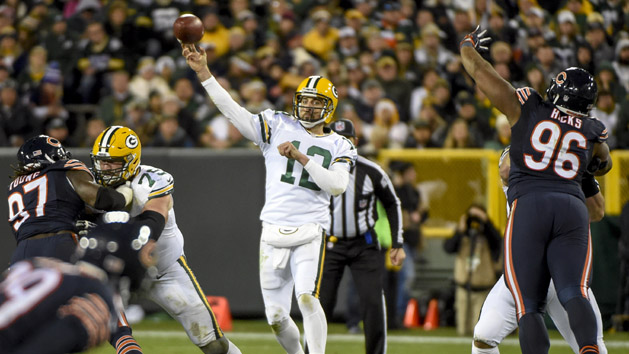 Oct 20, 2016; Green Bay, WI, USA; Green Bay Packers quarterback Aaron Rodgers (12) gets a pass away in the fourth quarter during the game against the Chicago Bears at Lambeau Field. Photo Credit: Benny Sieu-USA TODAY Sports
