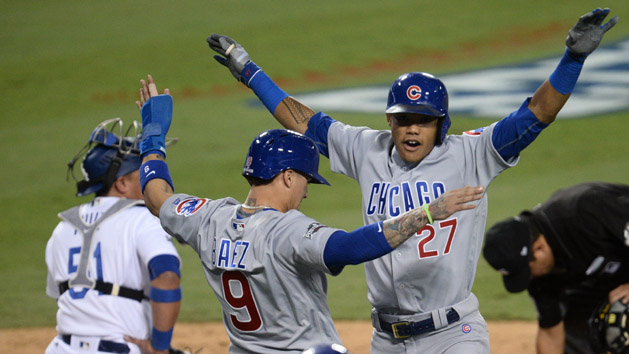 Oct 20, 2016; Los Angeles, CA, USA; Chicago Cubs shortstop Addison Russell (27) and second baseman Javier Baez (9) celebrate after his home run in the sixth inning against the Los Angeles Dodgersin game five of the 2016 NLCS playoff baseball series against the Los Angeles Dodgers at Dodger Stadium. Photo Credit: Gary A. Vasquez-USA TODAY Sports