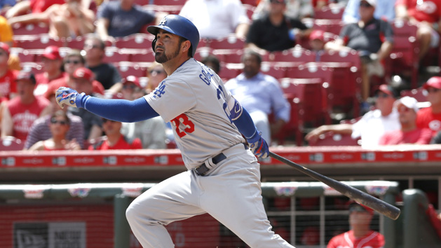 Aug 22, 2016; Cincinnati, OH, USA; Los Angeles Dodgers first baseman Adrian Gonzalez hits a solo home run against the Cincinnati Reds during the fifth inning at Great American Ball Park. Photo Credit: David Kohl-USA TODAY Sports