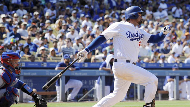 August 28, 2016; Los Angeles, CA, USA; Los Angeles Dodgers first baseman Adrian Gonzalez (23) hits a single in the seventh inning against the Chicago Cubs at Dodger Stadium. Photo Credit: Gary A. Vasquez-USA TODAY Sports