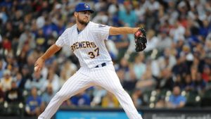 Surging Brewers try to stay in playoff chase vs. Padres