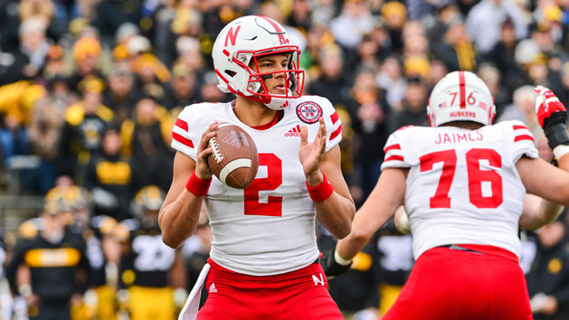 Nov 23, 2018; Iowa City, IA, USA; Nebraska Cornhuskers quarterback Adrian Martinez (2) drops back to throw a pass against the Iowa Hawkeyes during the first quarter at Kinnick Stadium. Photo Credit: Jeffrey Becker-USA TODAY Sports