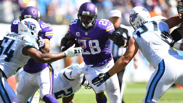 Sep 11, 2016; Nashville, TN, USA; Minnesota Vikings running back Adrian Peterson (28) runs for a short gain against the Tennessee Titans at Nissan Stadium. The Vikings won 25-16. Photo Credit: Christopher Hanewinckel-USA TODAY Sports