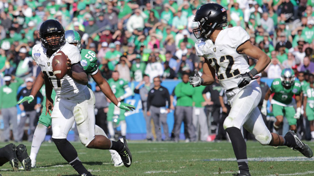 Dec 27, 2016; Dallas, TX, USA; Army Black Knights quarterback Ahmad Bradshaw (17) flips the ball to running back Tyler Campbell (22) in the first half against North Texas Mean Green in the first half in the Heart of Dallas Bowl at Cotton Bowl Stadium. Photo Credit: Sean Pokorny-USA TODAY Sports