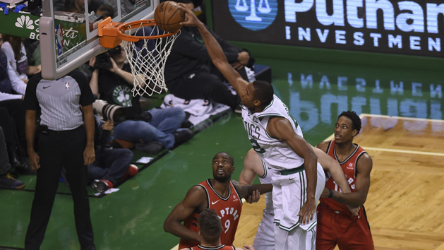 Nov 12, 2017; Boston, MA, USA; Boston Celtics forward Al Horford (42) dunks the ball past Toronto Raptors guard DeMar DeRozan (10) during the first half at TD Garden. Photo Credit: Bob DeChiara-USA TODAY Sports