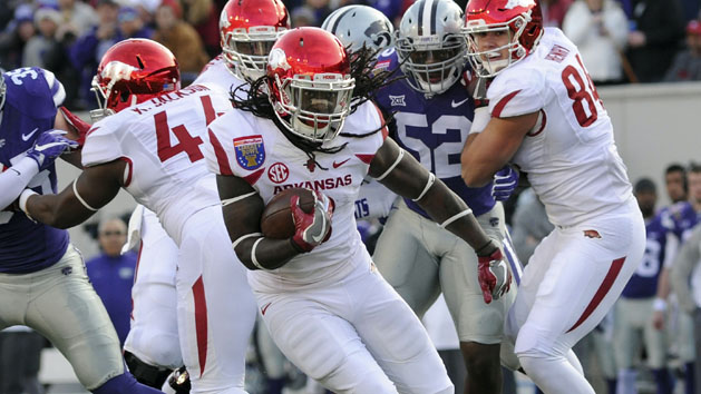 Alex Collins (3) carries the ball against the Kansas State Wildcats in the Liberty Bowl. Arkansas defeated Kansas State Wildcats 45-23. ( Justin Ford-USA TODAY Sports)