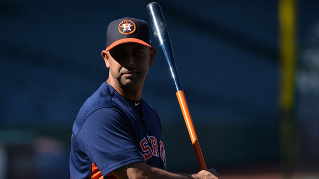 Aug 26, 2017; Anaheim, CA, USA; Houston Astros bench coach Alex Cora (26) looks on during batting practice before the game against the Los Angeles Angels at Angel Stadium of Anaheim. Photo Credit: Orlando Ramirez-USA TODAY Sports