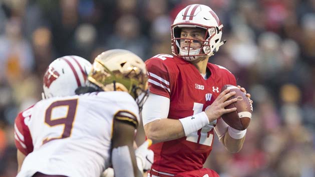 Nov 24, 2018; Madison, WI, USA; Wisconsin Badgers quarterback Alex Hornibrook (12) looks to pass the football during the second quarter against the Minnesota Golden Gophers at Camp Randall Stadium. Photo Credit: Jeff Hanisch-USA TODAY Sports