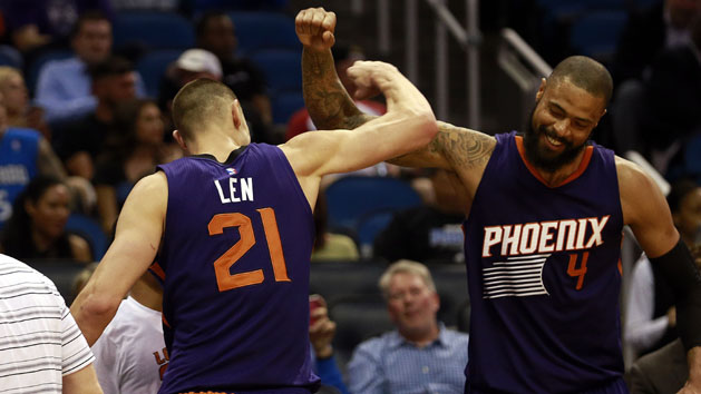 Mar 4, 2016; Orlando, FL, USA; Phoenix Suns center Alex Len (21) is congratulated by center Tyson Chandler (4) during the second half at Amway Center. Mandatory Credit: Kim Klement-USA TODAY Sports