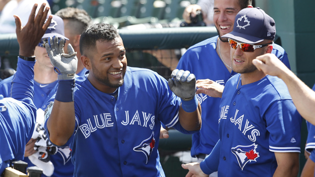 Mar 26, 2017; Lakeland, FL, USA; Toronto Blue Jays second baseman Alex Monsalve (left) gets a pat on the back after a home run during the ninth inning of a MLB spring training baseball game against the Detroit Tigers at Joker Marchant Stadium. The Blue Jays won 4-3. Photo Credit: Reinhold Matay-USA TODAY Sports
