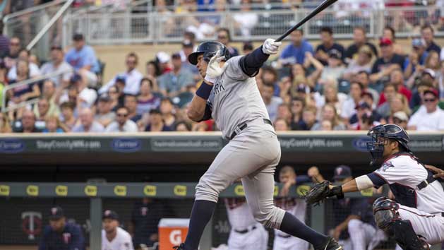 Jul 24, 2015; Minneapolis, MN, USA; New York Yankees designated hitter Alex Rodriguez (13) hits a single in the first inning against the Minnesota Twins at Target Field. Mandatory Credit: Jesse Johnson-USA TODAY Sports
