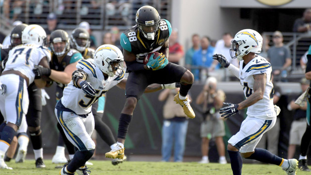 Nov 12, 2017; Jacksonville, FL, USA; Jacksonville Jaguars wide receiver Allen Hurns (88) catches a pass as Los Angeles Chargers inside linebacker Korey Toomer (56) and cornerback Trevor Williams (24) defend during a game at EverBank Field. The Jaguars defeated the Chargers 20-17 in overtime. Photo Credit: Kirby Lee-USA TODAY Sports