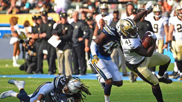 Aug 20, 2017; Carson, CA, USA; New Orleans Saints running back Alvin Kamara (41) gets past Los Angeles Chargers defensive back Tre Boston (33) and Los Angeles Chargers cornerback Michael Davis (43) as he runs for a touchdown in the first quarter of the game at StubHub Center. Photo Credit: Jayne Kamin-Oncea-USA TODAY Sports