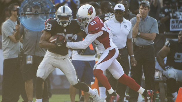 August 30, 2015; Oakland, CA, USA; Oakland Raiders wide receiver Amari Cooper (89) runs against Arizona Cardinals cornerback Patrick Peterson (21) during the second quarter in a preseason NFL football game at O.co Coliseum. Mandatory Credit: Kyle Terada-USA TODAY Sports
