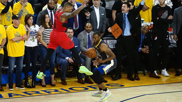 May 16, 2019; Oakland, CA, USA; Golden State Warriors guard Andre Iguodala (9) steals the ball from Portland Trail Blazers guard Damian Lillard (0) on the final play of the fourth quarter in game two of the Western conference finals of the 2019 NBA Playoffs at Oracle Arena. Photo Credit: Kelley L Cox-USA TODAY Sports