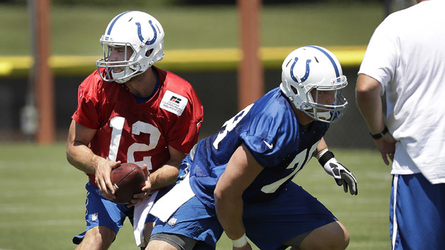 Jul 27, 2016; Anderson, IN, USA; Indianapolis Colts quarterback Andrew Luck (12) works with center Ryan Kelly (78) during training camp at Anderson University. Photo Credit: Matt Kryger/Indianapolis Star via USA TODAY Sports