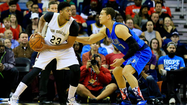 Nov 10, 2015; New Orleans, LA, USA; New Orleans Pelicans forward Anthony Davis (23) is guarded by Dallas Mavericks forward Dwight Powell (7) during the second quarter of a game at the Smoothie King Center. Mandatory Credit: Derick E. Hingle-USA TODAY Sports