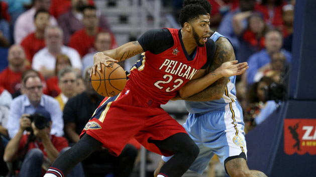 Oct 26, 2016; New Orleans, LA, USA; New Orleans Pelicans forward Anthony Davis (23) is defended by Denver Nuggets forward Wilson Chandler (21) in the first quarter at the Smoothie King Center. Photo Credit: Chuck Cook-USA TODAY Sports