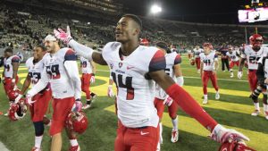 Cardinals survive late turnover to upset Patriots