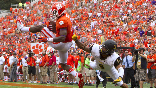 Sep 12, 2015; Clemson, SC, USA; Clemson Tigers wide receiver Artavis Scott (3) scores a touchdown while being defended by Appalachian State Mountaineers defensive back Mondo Williams (4) during the second half at Clemson Memorial Stadium. Mandatory Credit: Joshua S. Kelly-USA TODAY Sports