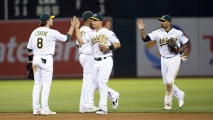 A’s rally in ninth to beat Tigers 4-3