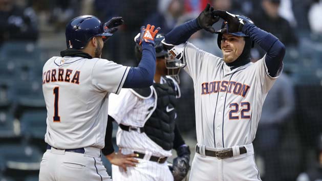 Apr 21, 2018; Chicago, IL, USA; Houston Astros right fielder Josh Reddick (22) celebrates with shortstop Carlos Correa (1) after hitting grand slam off Chicago White Sox starting pitcher Lucas Giolito (not pictured) during the second inning at Guaranteed Rate Field. Photo Credit: Kamil Krzaczynski-USA TODAY Sports