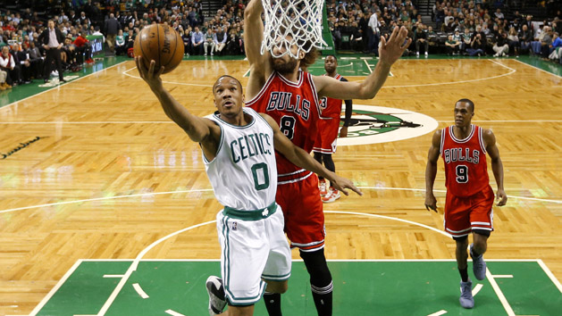 Mar 12, 2017; Boston, MA, USA; Boston Celtics guard Avery Bradley (0) goes to the basket past Chicago Bulls center Robin Lopez (8) during the second half of the Boston Celtics 100-80 win over the Chicago Bulls at TD Garden. Photo Credit: Winslow Townson-USA TODAY Sports