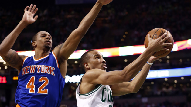 Mar 4, 2016; Boston, MA, USA; Boston Celtics guard Avery Bradley (0) shoots the ball against New York Knicks forward Lance Thomas (42) during the second half at TD Garden. Mandatory Credit: Mark L. Baer-USA TODAY Sports